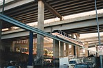 Monorail train next to goods line under expressway at rear of Darling Harbour thumbnail
