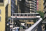 Monorail train with advertising crossing sides in Market Street thumbnail